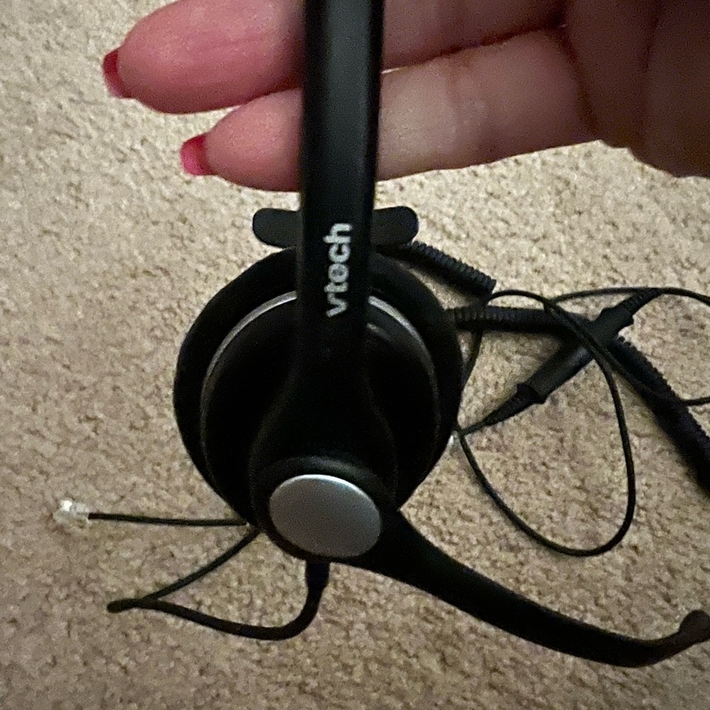 Sleek Black and Silver Over-Ear Headphones with Foldable Design